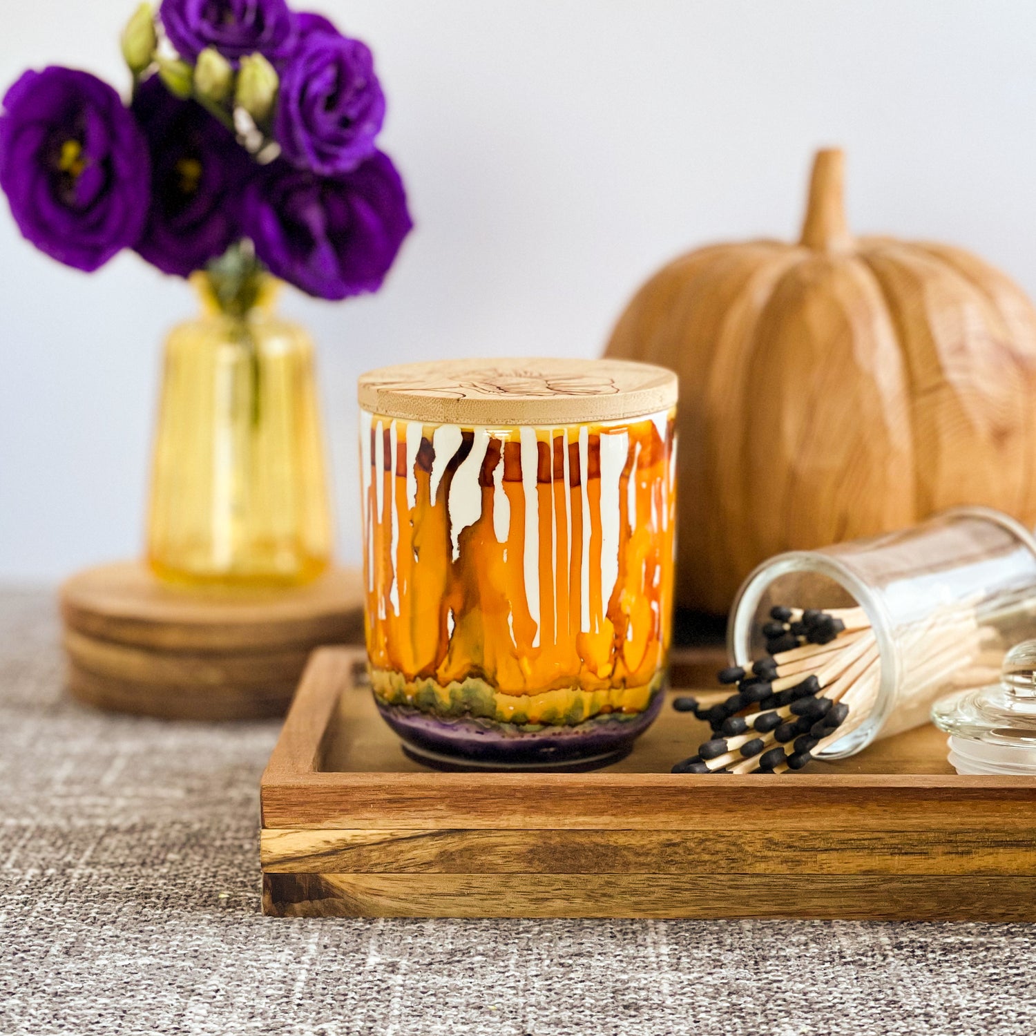 Drippy golden yellow and burnt orange with a bit of smoky purple around the base. Handpainted ceramic candle, unique candles for fall