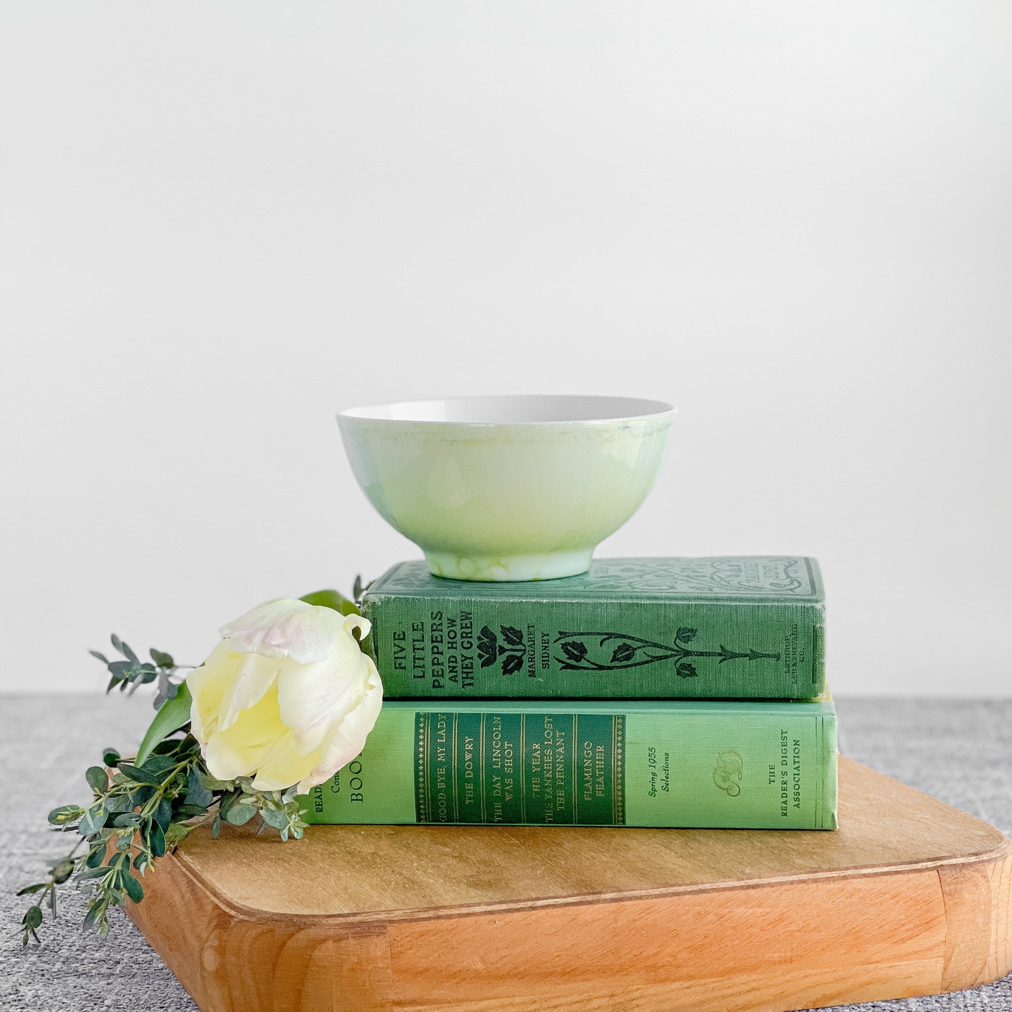 Handpainted, three wick ceramic candle in very soft green
