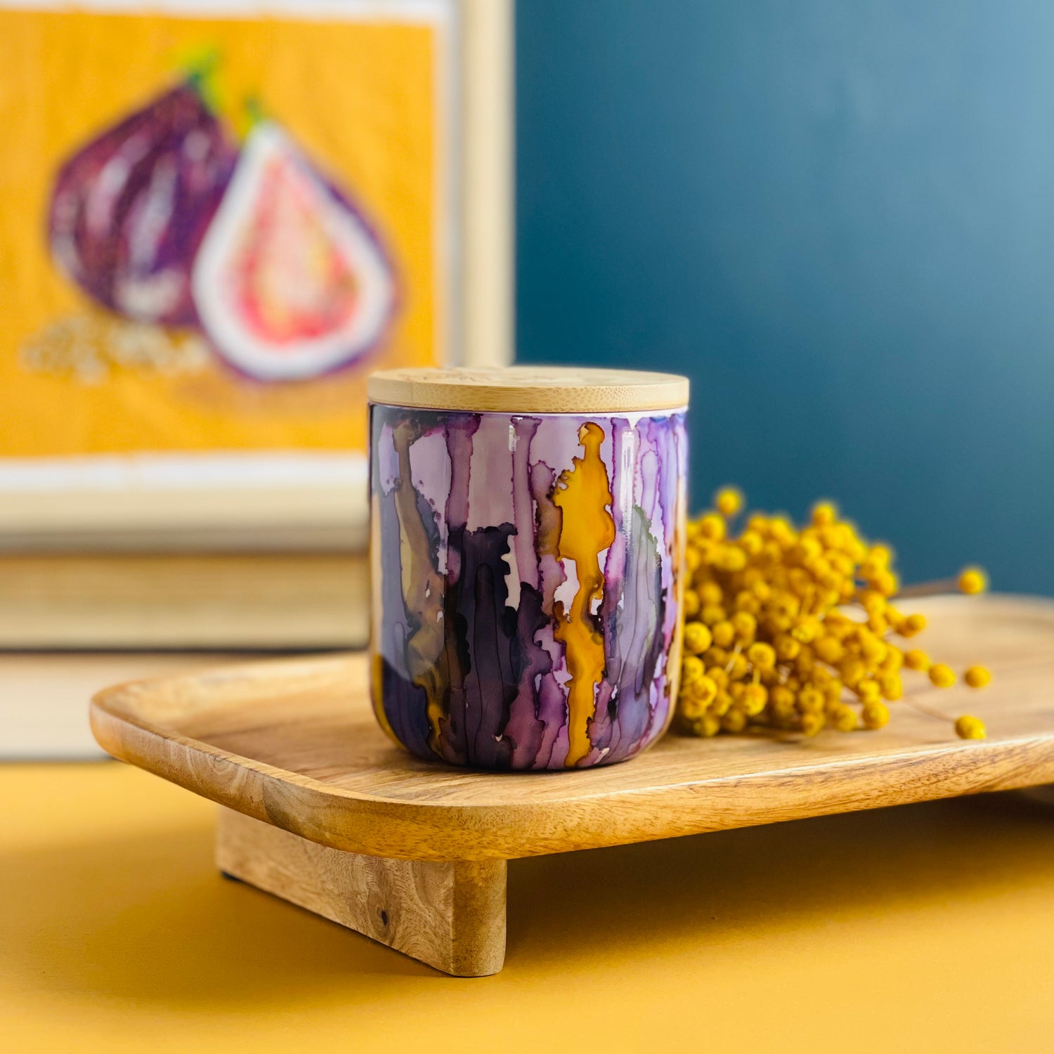 Handpainted ceramic candle in shades of plum and violet accented with golden yellow, unique candles for fall