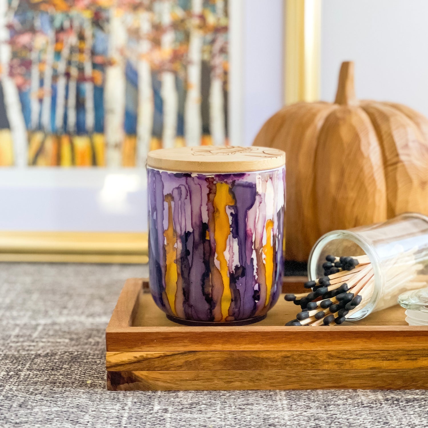 Handpainted ceramic candle in shades of plum and violet accented with golden yellow, unique candles for fall