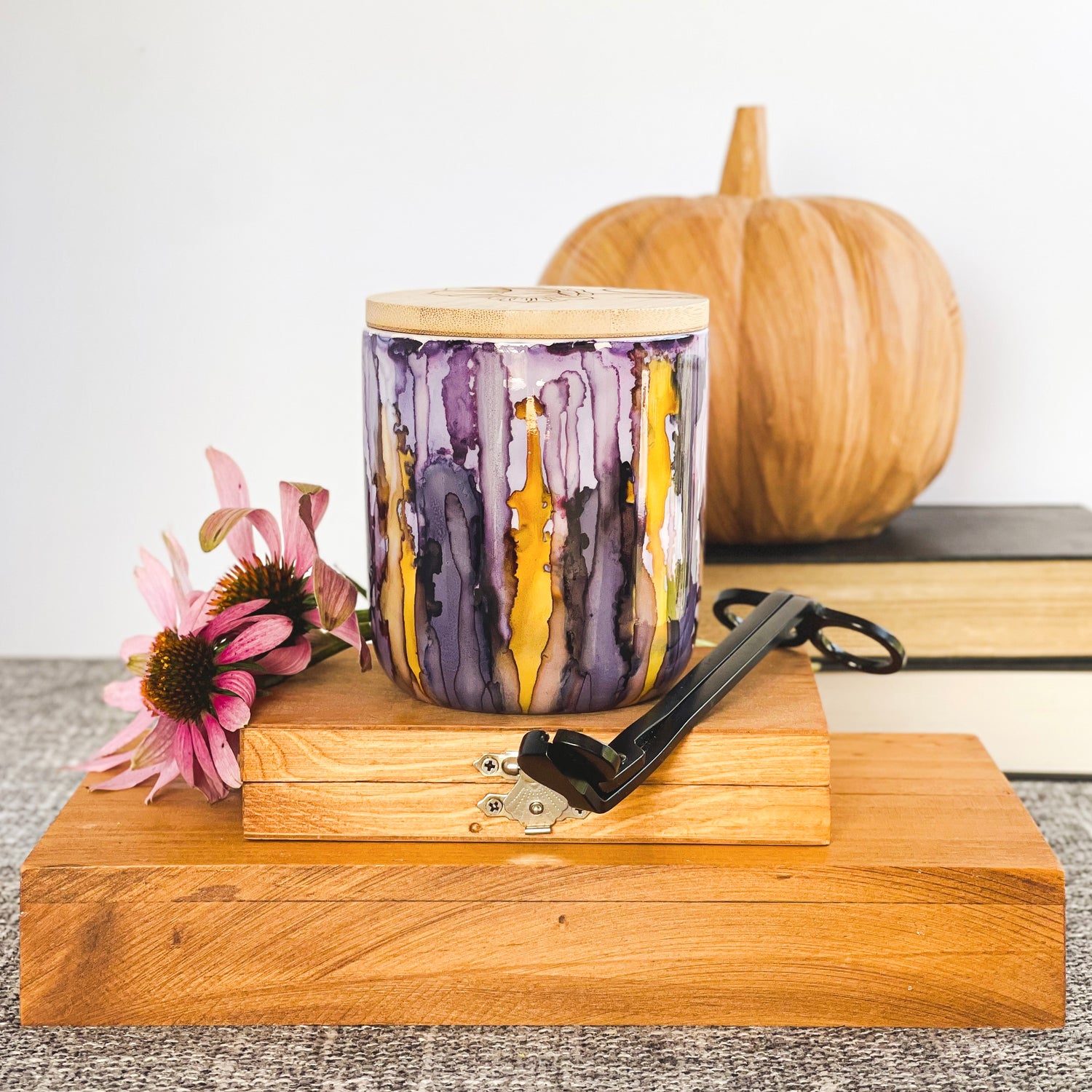 Handpainted ceramic candle in shades of plum and violet accented with golden yellow, unique candles for fall