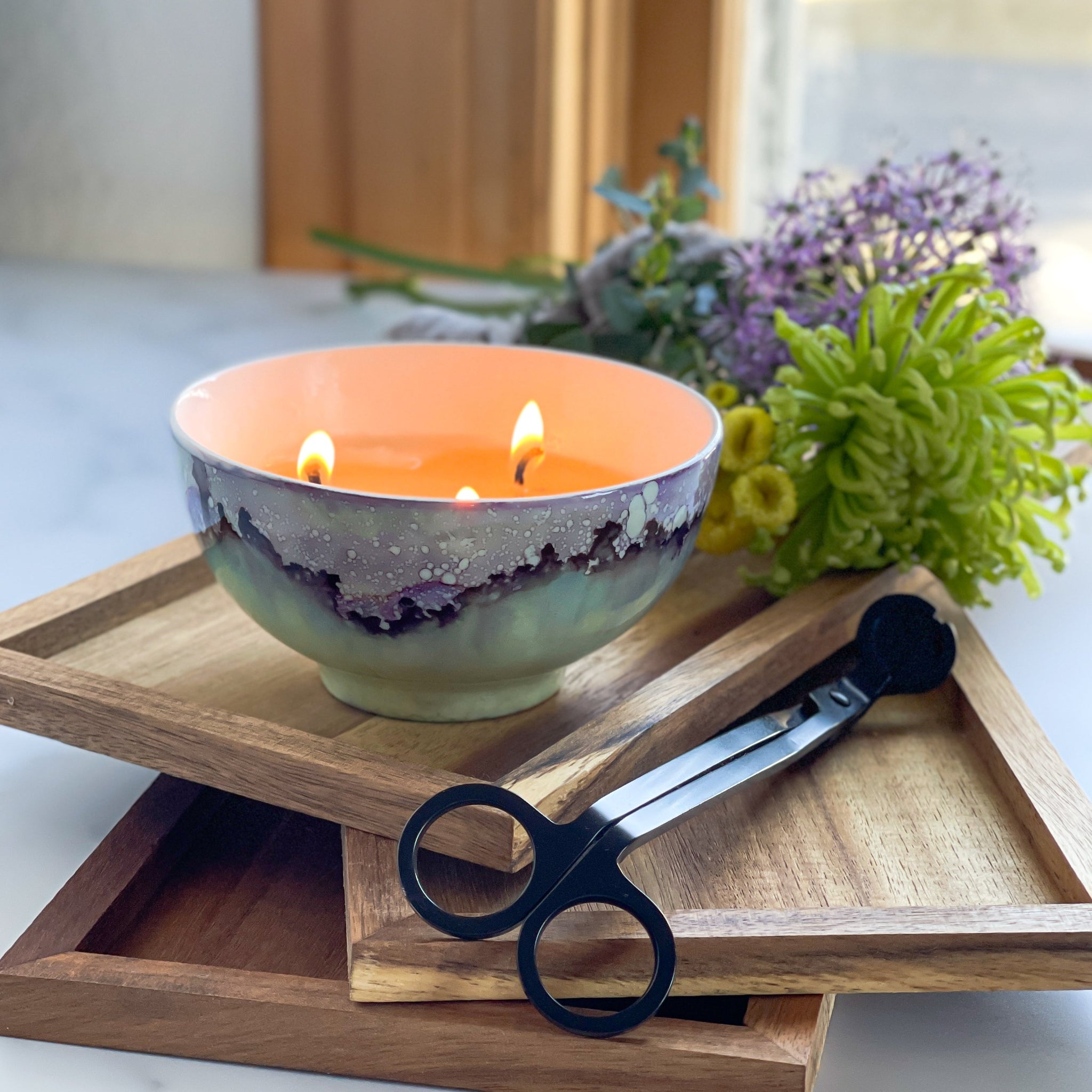 Handpainted ceramic candle in soft green and purple