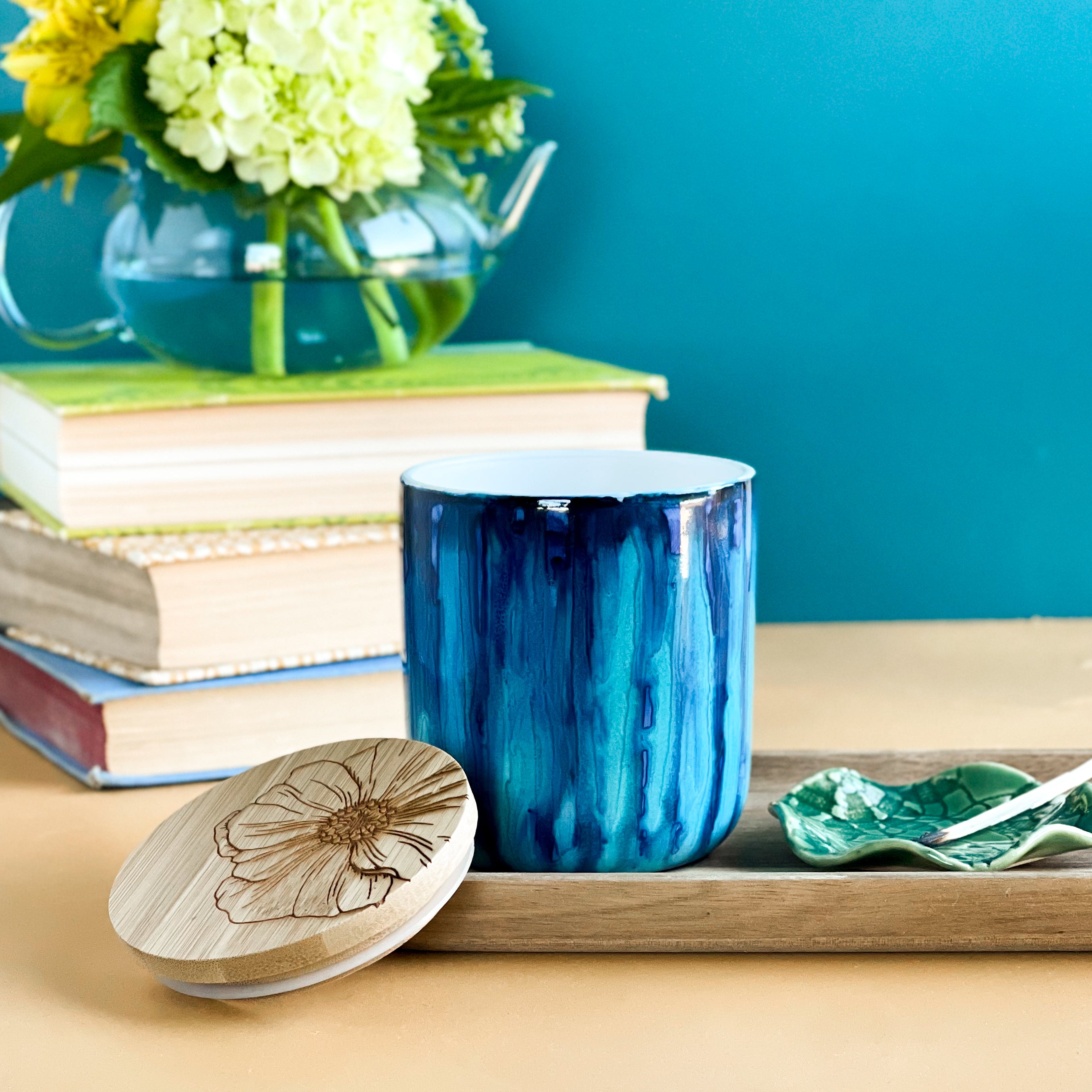 Tall, two wick ceramic soy candle handpainted in beautiful blues and deep teal