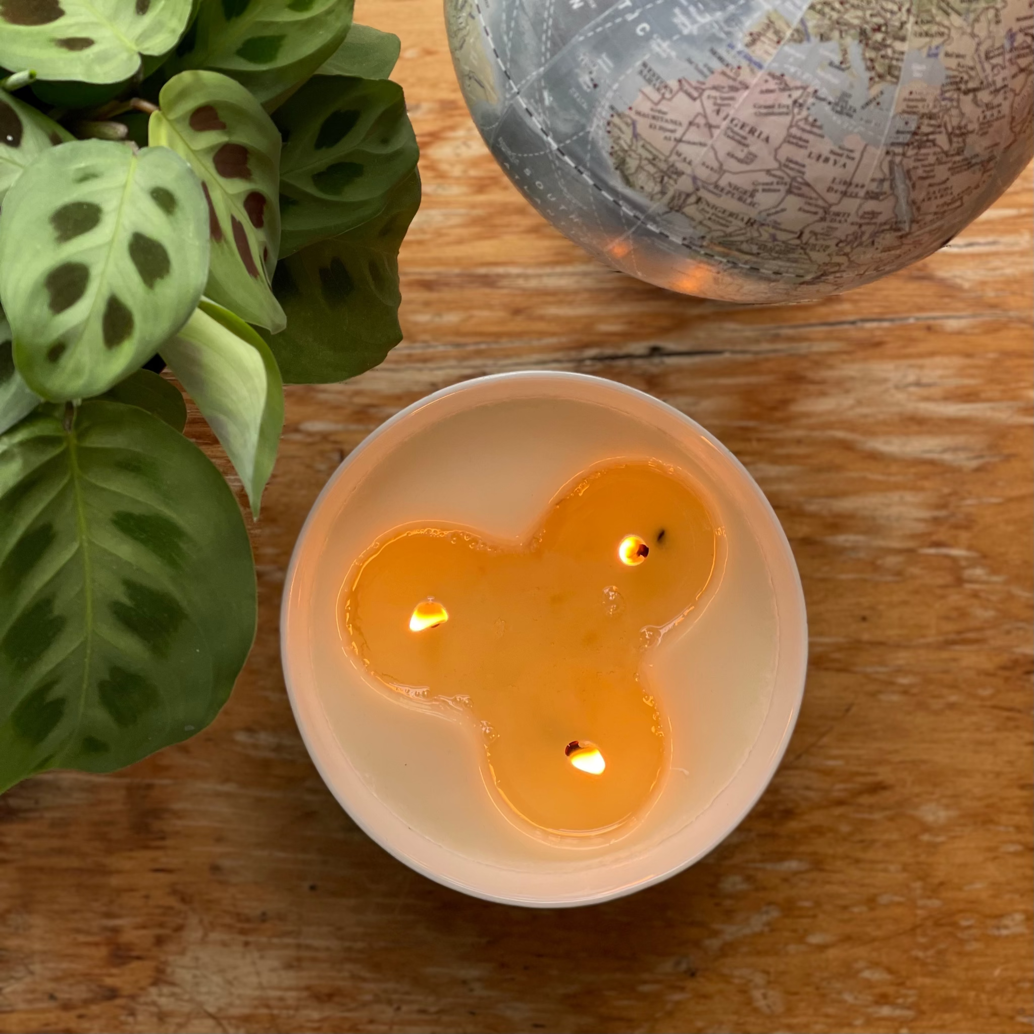 top view of a three wick ceramic candle