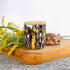 Mottled purple, mocha, and golden yellow handpainted ceramic candle, unique candles for fall