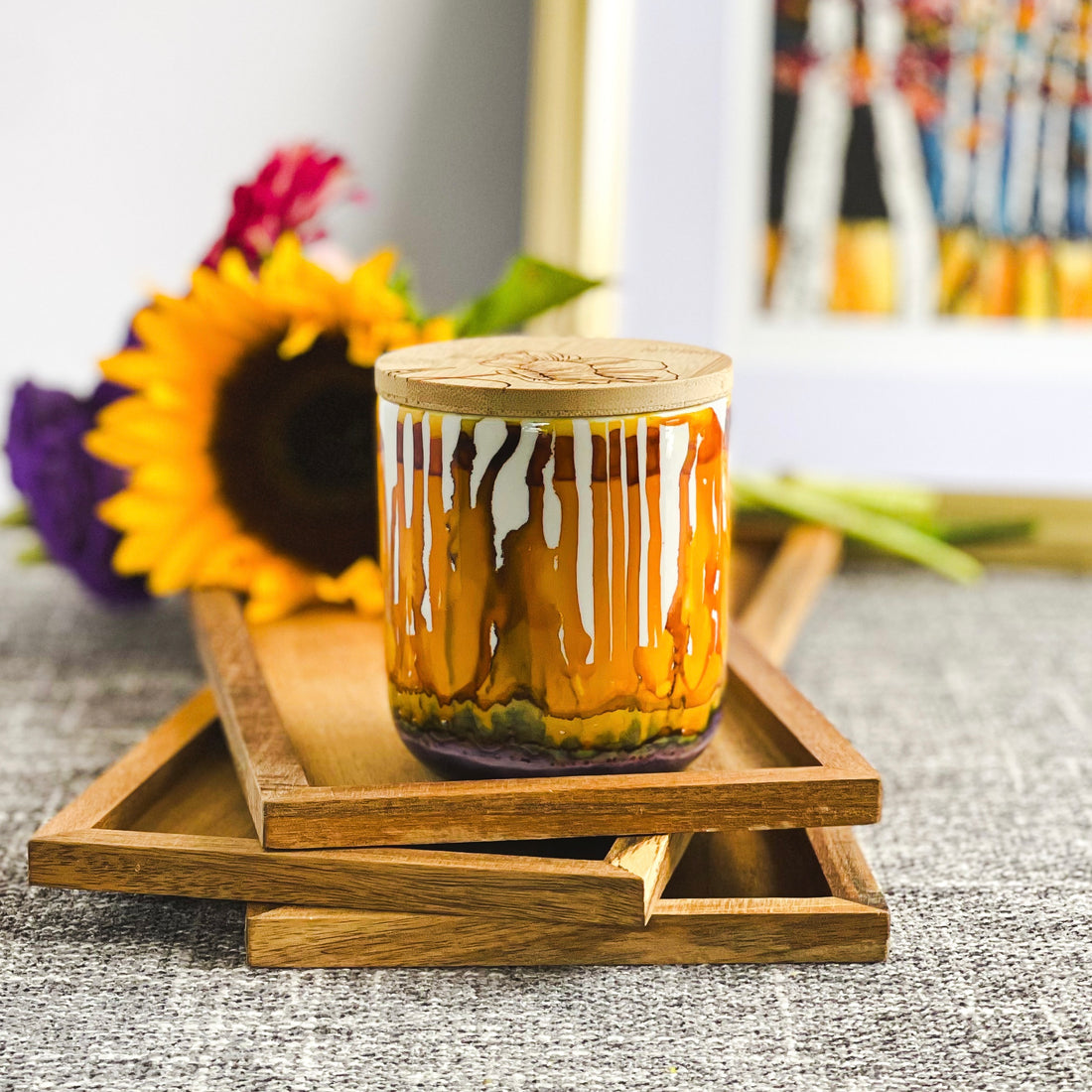 Drippy golden yellow and burnt orange with a bit of smoky purple around the base. Handpainted ceramic candle, unique candles for fall