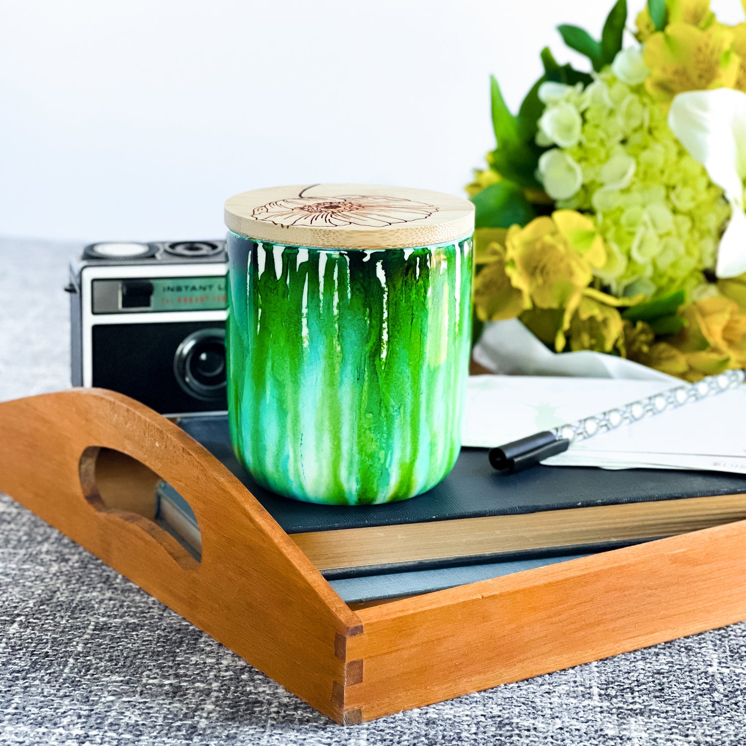 Tall, two wick ceramic soy candle handpainted in drippy shades of green