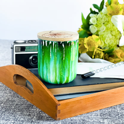 Tall, two wick ceramic soy candle handpainted in drippy shades of green