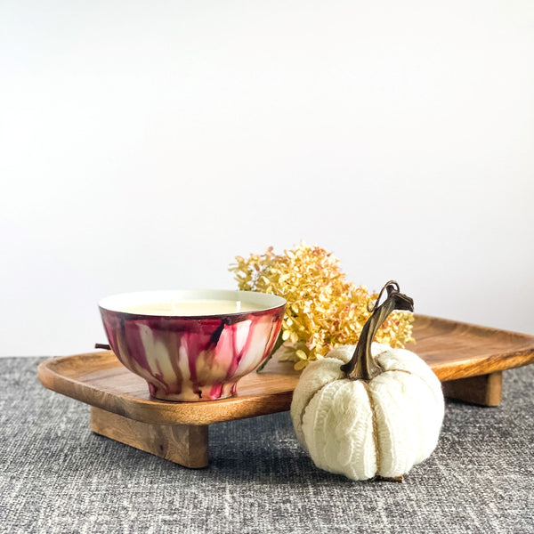 Soft red and tan fall candle in a ceramic vessel, unique candle for fall