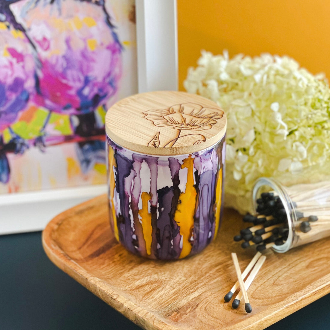 Handpainted ceramic candle in shades of plum and violet accented with golden yellow, unique candles for fall