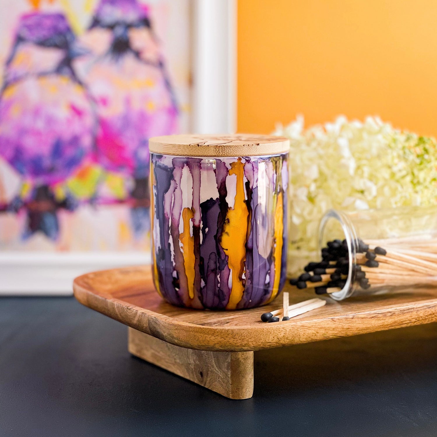 Tall, two wick ceramic candle handpainted in purples and golden yellows