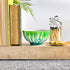 Ceramic three wick candle handpainted in bright teals and emerald greens