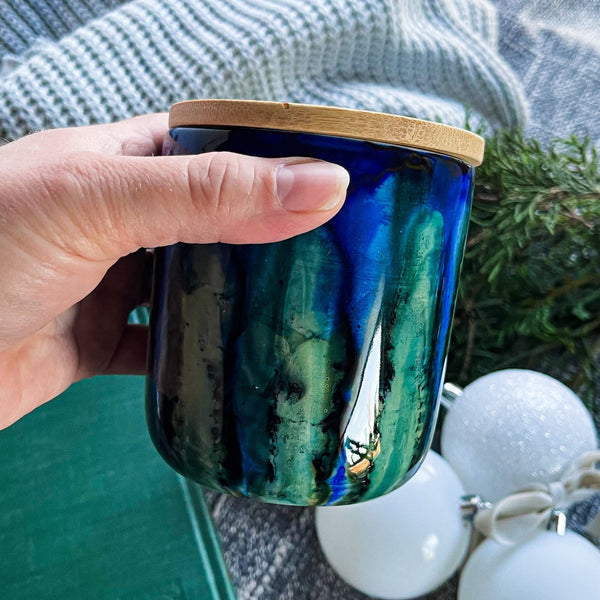 Handpainted ceramic candle in blues and greens