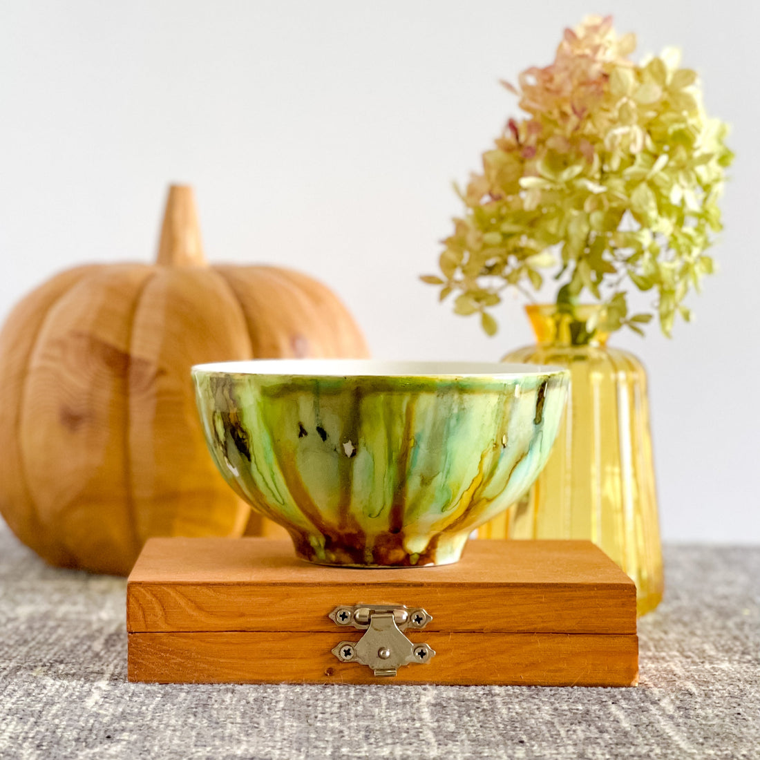 muted green and brown handpainted three wick ceramic candle
