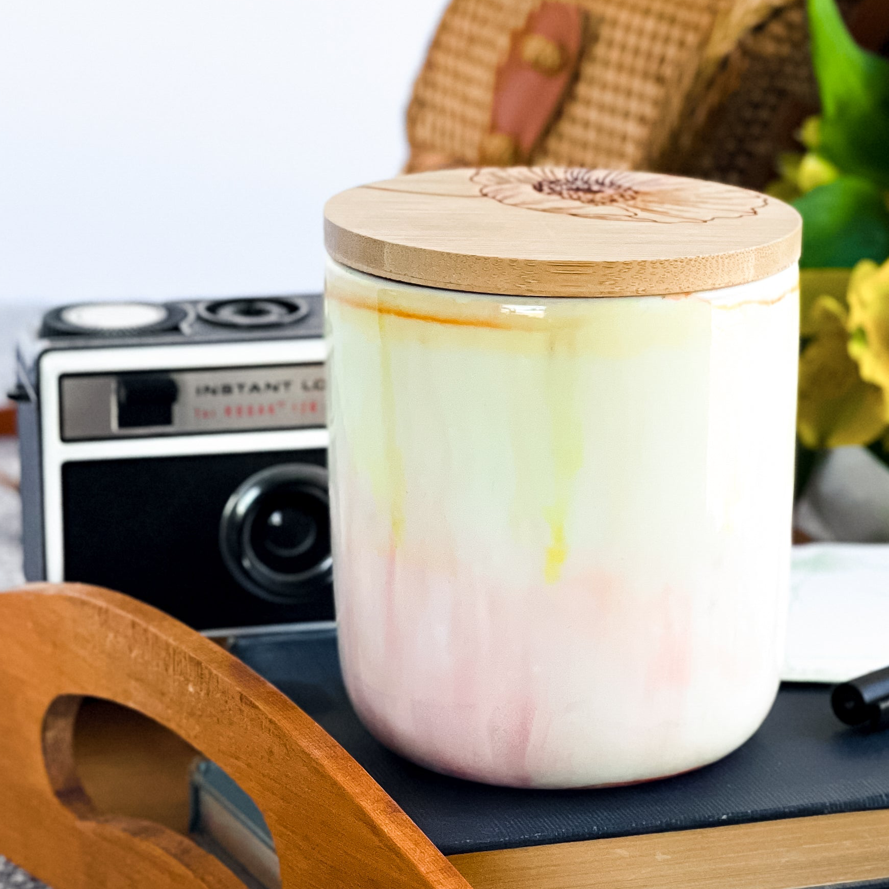 Tall, two wick soy candle handpainted in pale pinks and yellows