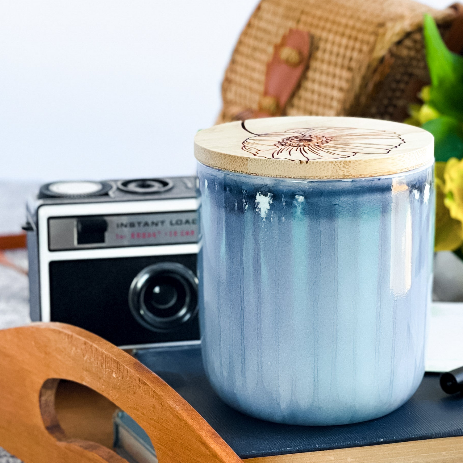Tall, two wick ceramic soy candle handpainted in soft, blended shades of blue