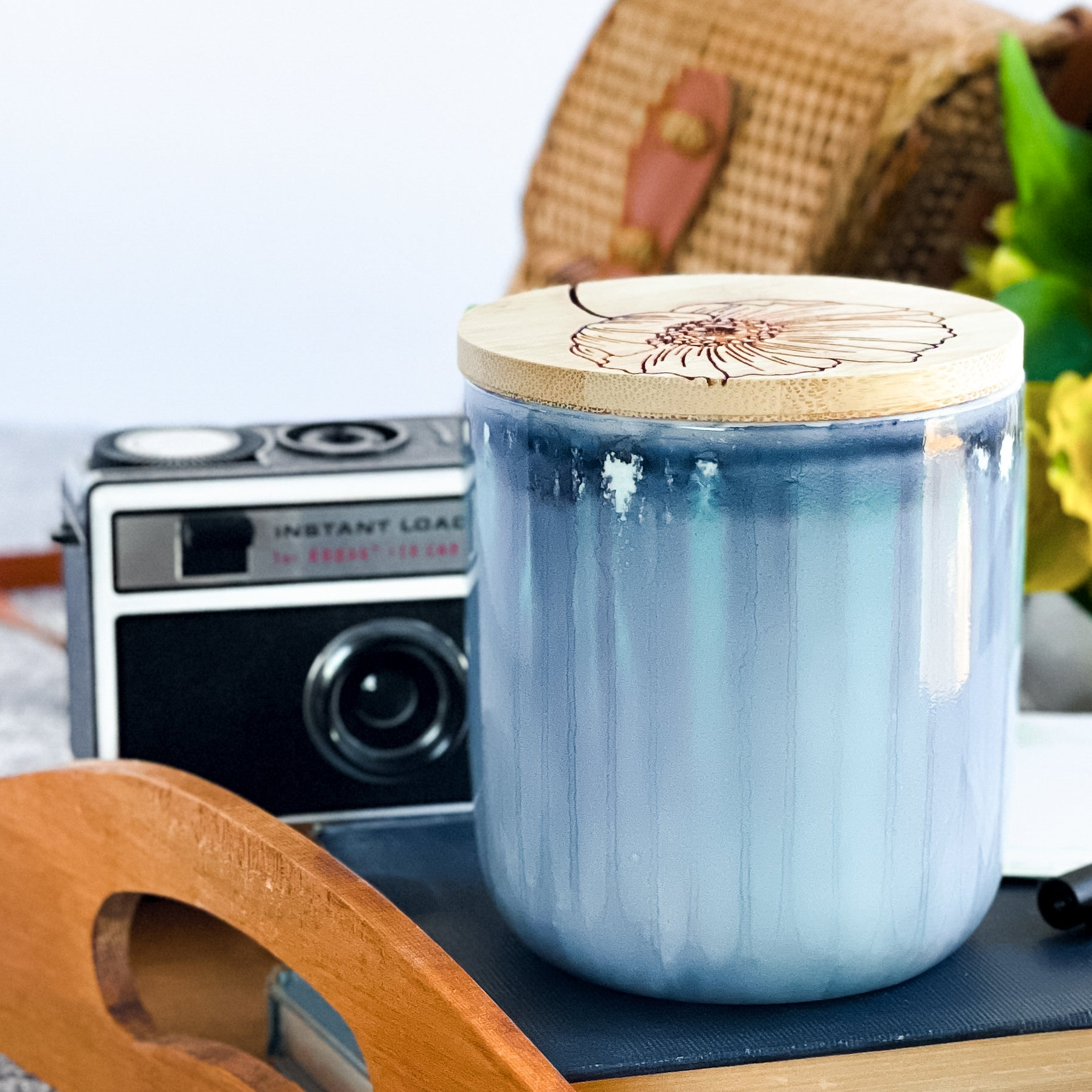 Tall, two wick ceramic soy candle handpainted in soft, blended shades of blue
