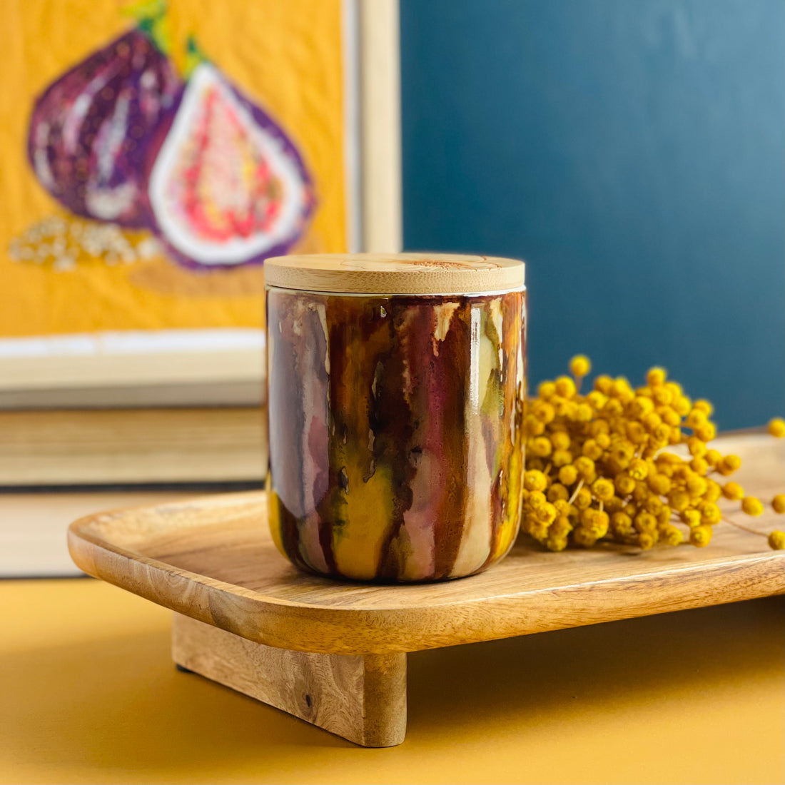 Handpainted ceramic candle in multiple shades of rich browns a touch of cinnamon color and ample golden yellow, unique candles for fall