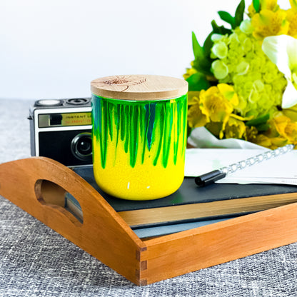 Tall, two wick ceramic soy candle handpainted in bright green and sunny yellow