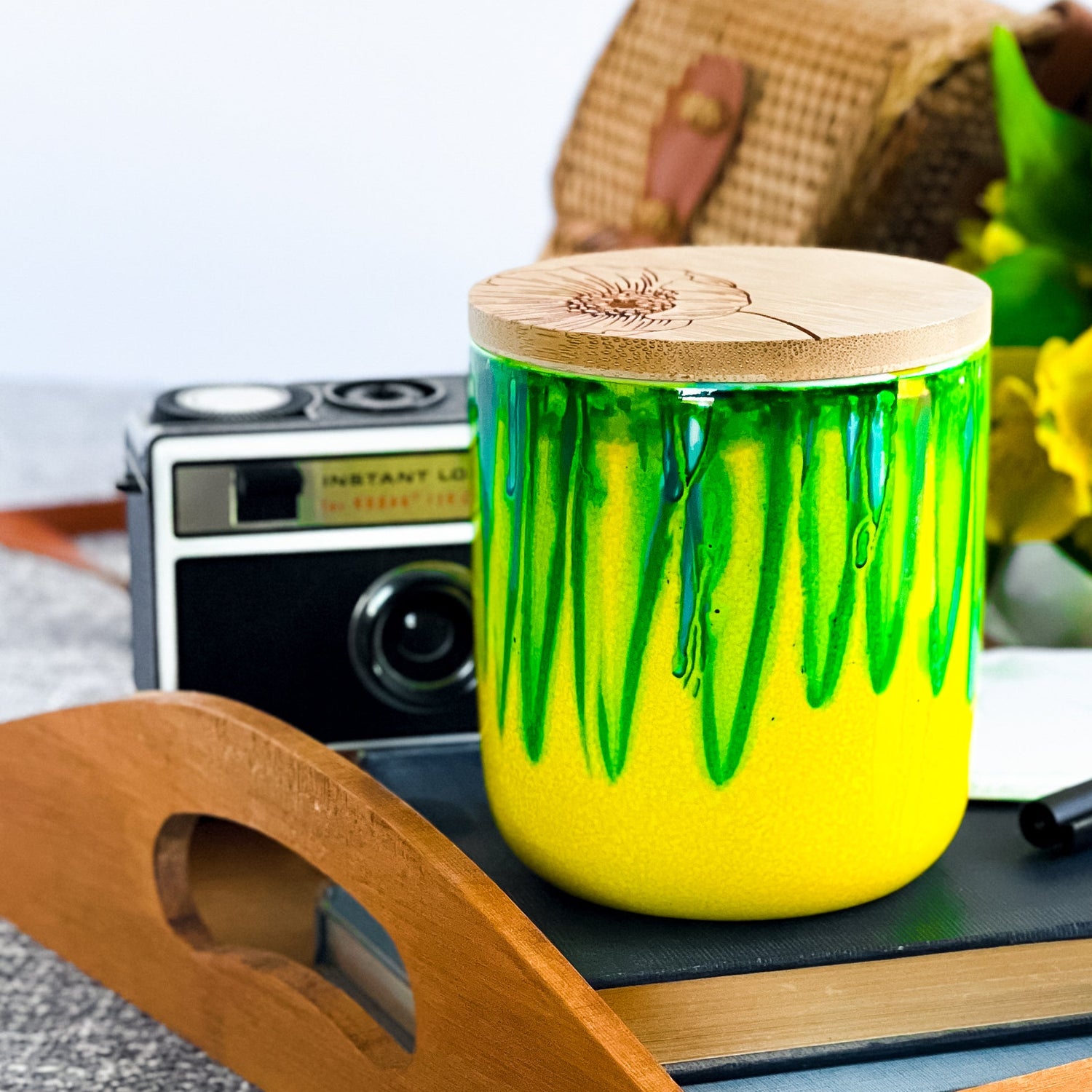 Tall, two wick ceramic soy candle handpainted in bright green and sunny yellow