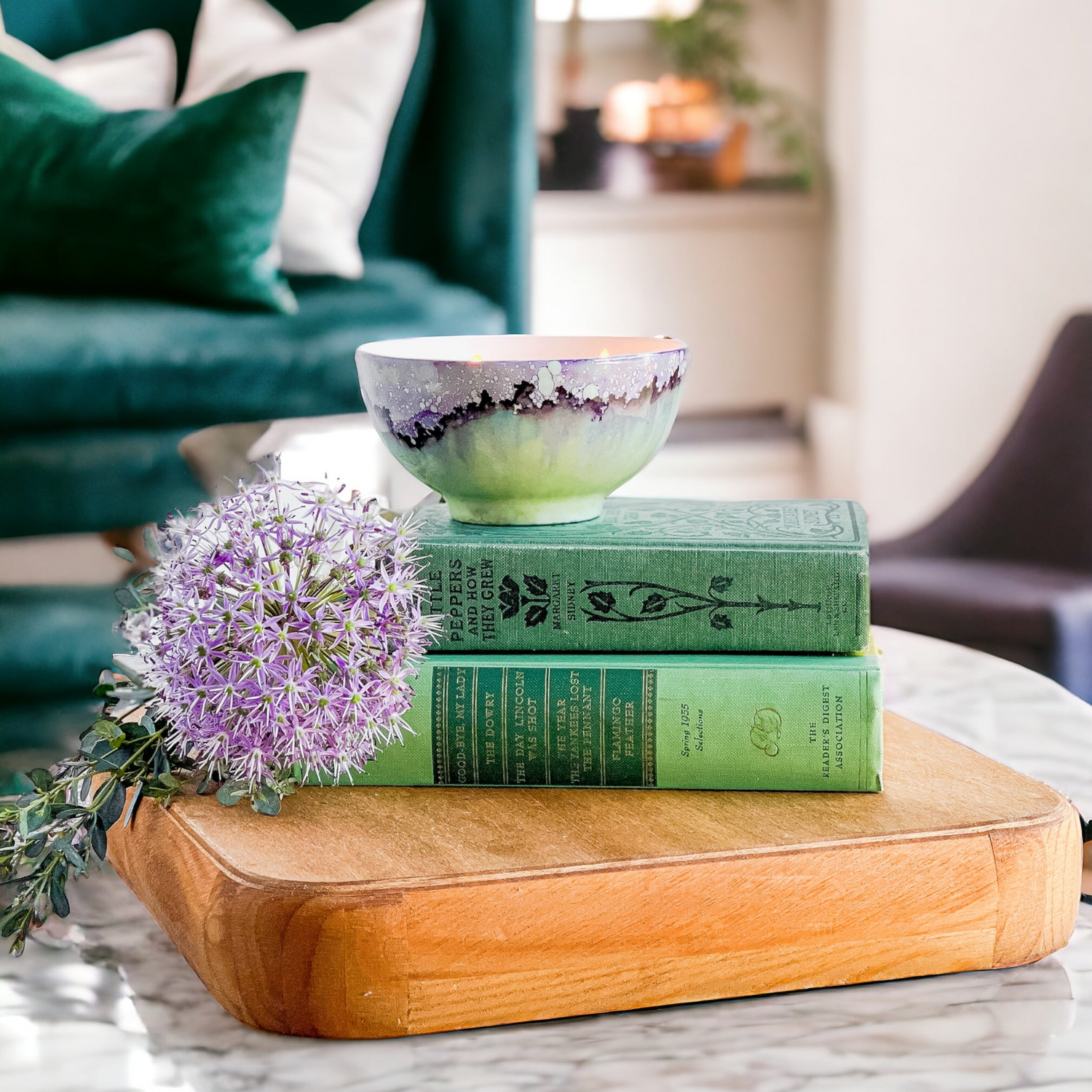 Handpainted ceramic candle in soft green and purple