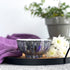 Handpainted ceramic candle in dark grays and purples