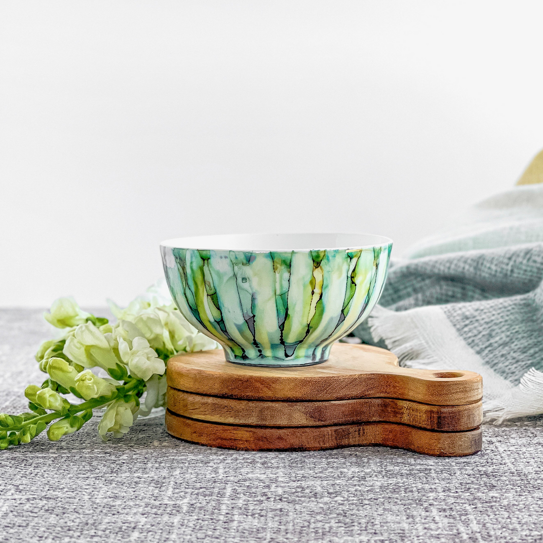 Ceramic three wick candle handpainted in teals, greens, and blues