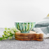 Ceramic three wick candle handpainted in teals, greens, and blues