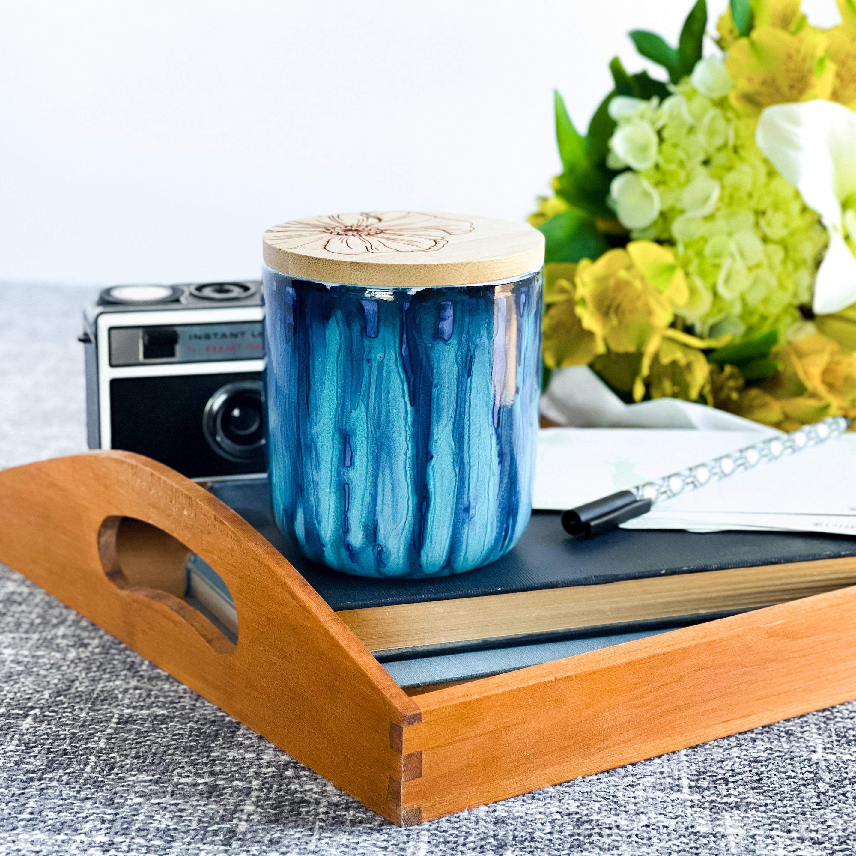 Tall, two wick ceramic soy candle handpainted in beautiful blues and deep teal