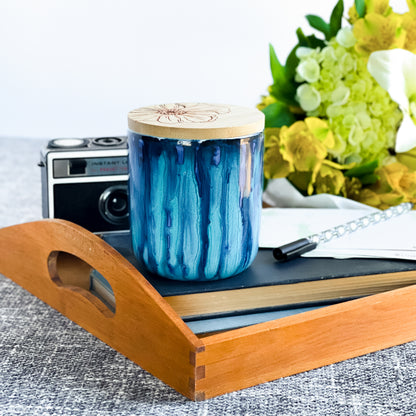 Tall, two wick ceramic soy candle handpainted in beautiful blues and deep teal