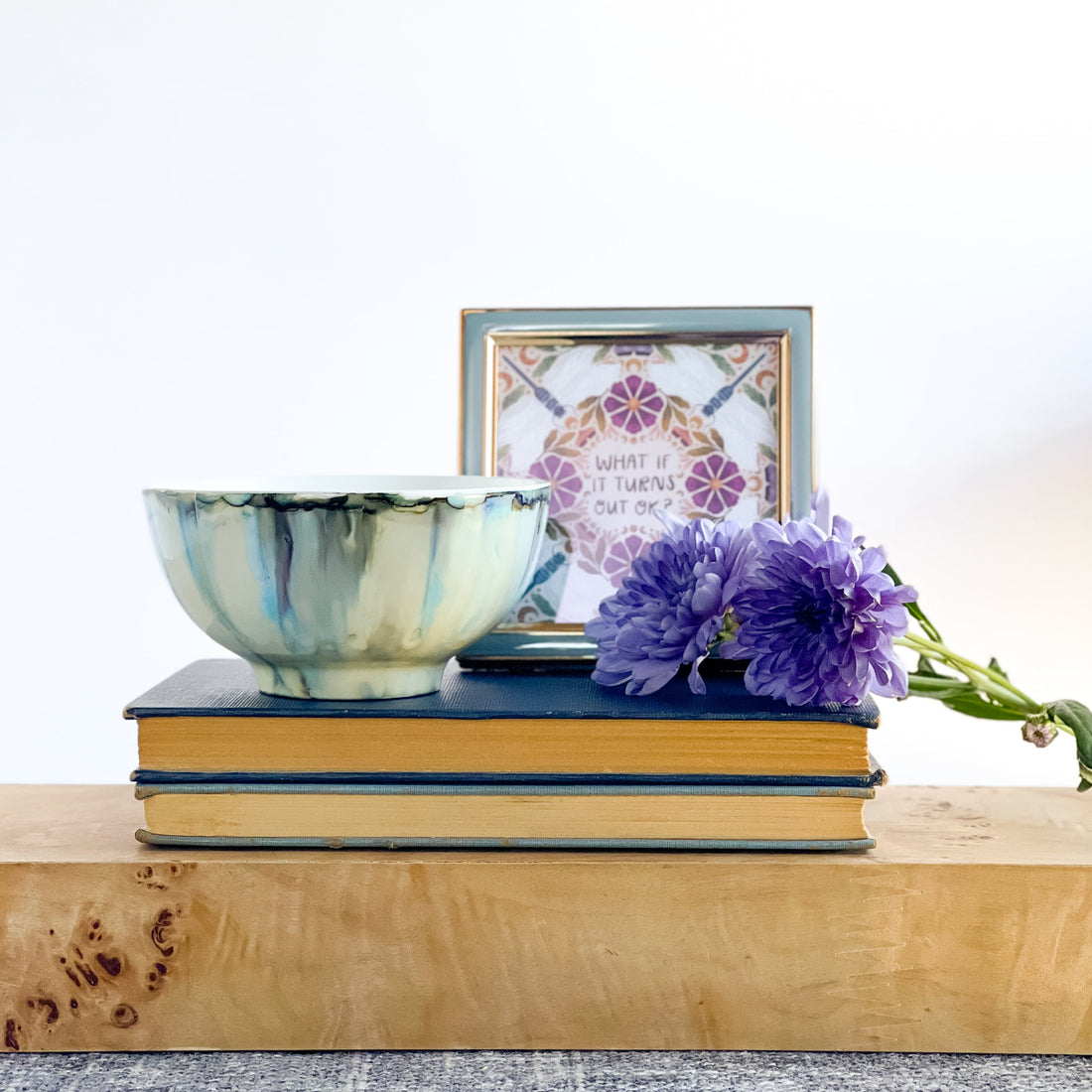 Handpainted ceramic candle in soft blues and grays
