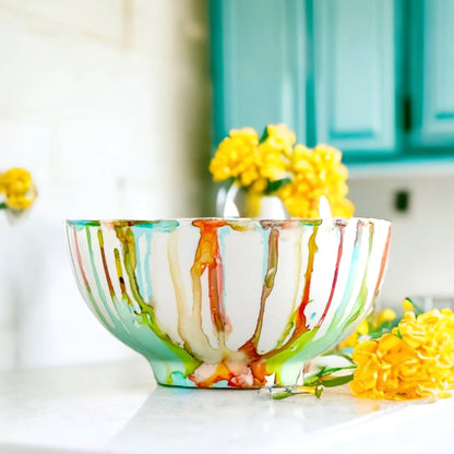 Ceramic soy candle handpainted in vivid reds, teals, greens and yellows